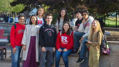 Rutgers students hanging out and chatting outside of Livingston Student Center